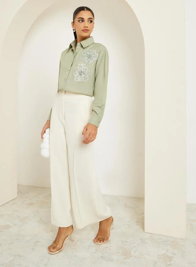 ستايلي بلوزة بأكمام طويلة ومطرز بزهور